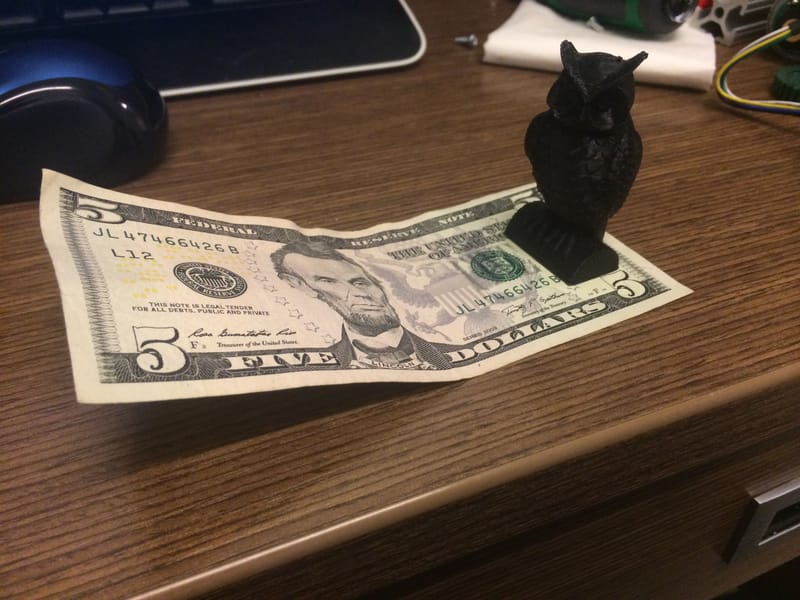 Owl on a $5 Bill for Size Comparison.