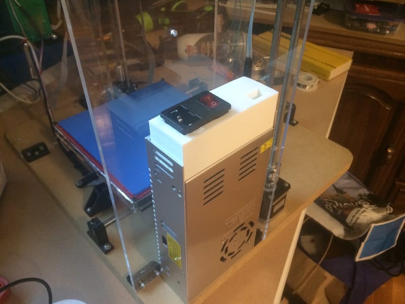 3D Printed IEC Cage Mounted onto the Power Supply