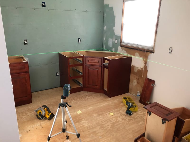Installing Lower Cabinets with Laser Level