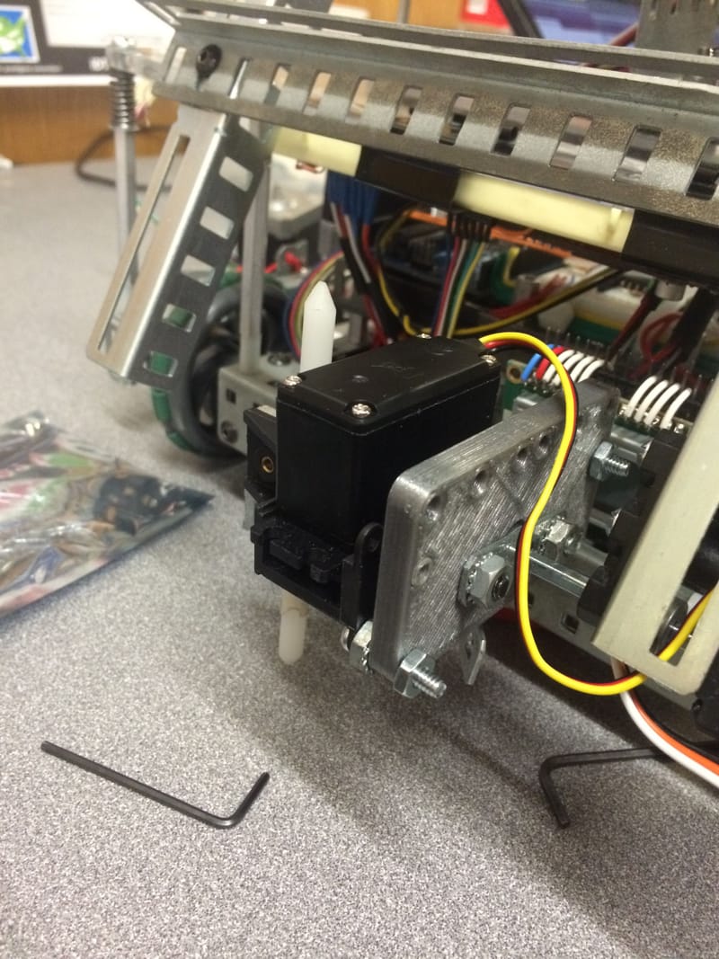 Close-up of the stepper motor, lift mechanism, and 3D printed adapter.