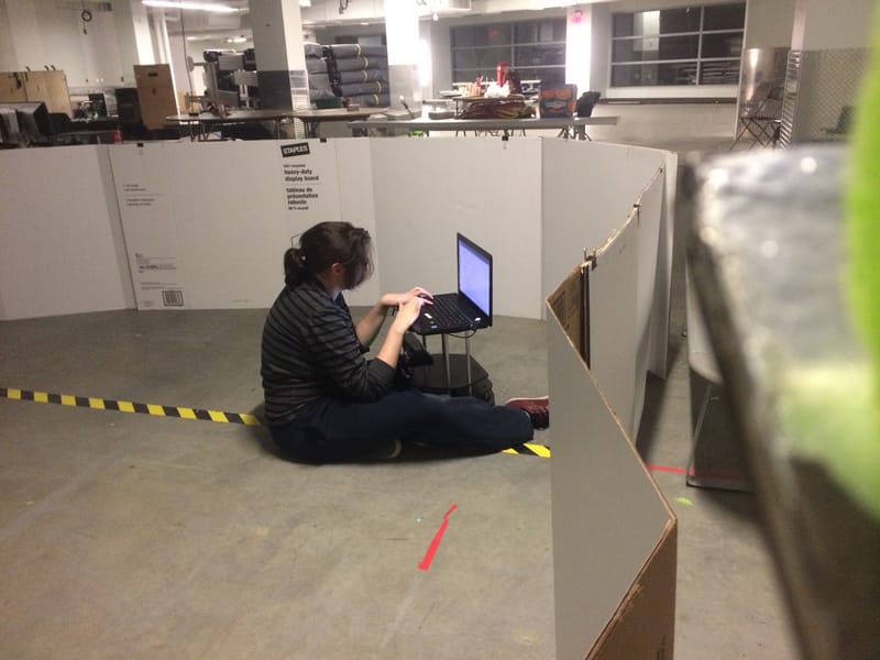 Team members programming and observing