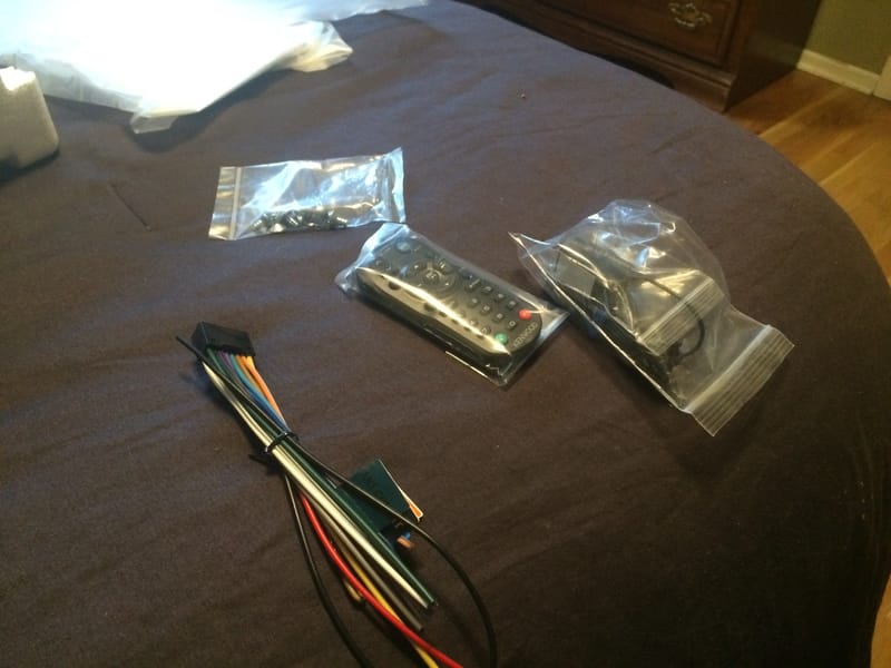 An infrared remote, wiring harness, and other components that came with it.